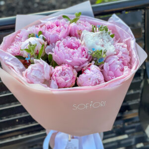 A stunning bouquet of 15 vibrant pink peonies, their delicate, ruffled petals creating a beautiful floral display - the perfect gift from Calgary's top florist.